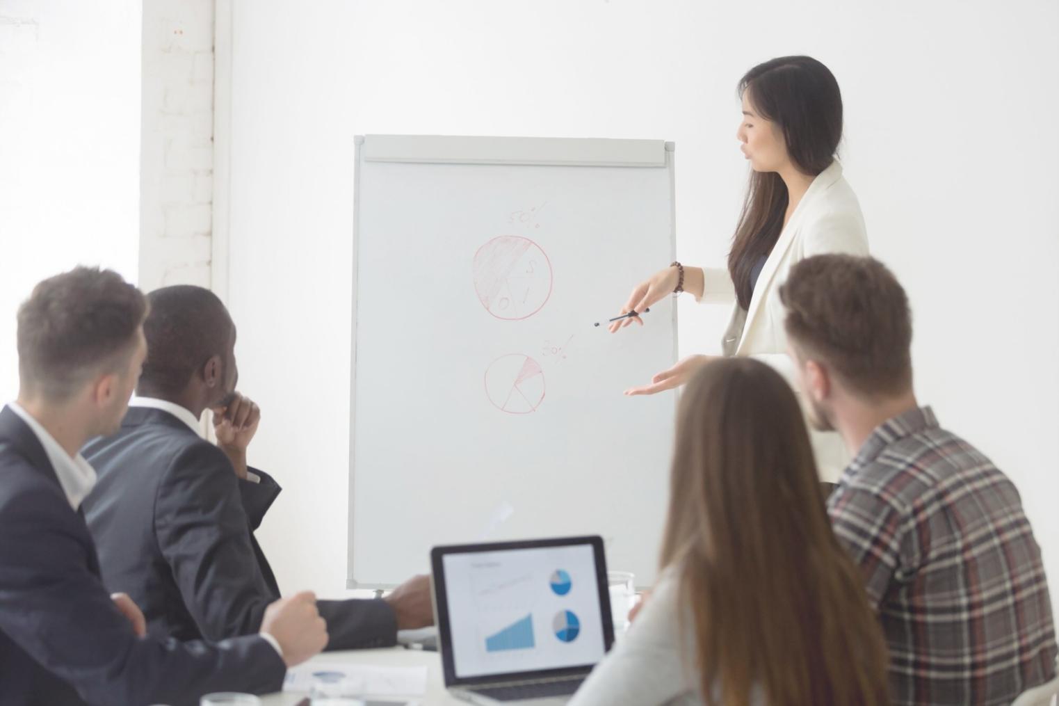 Students collaborating on financial record analysis projects