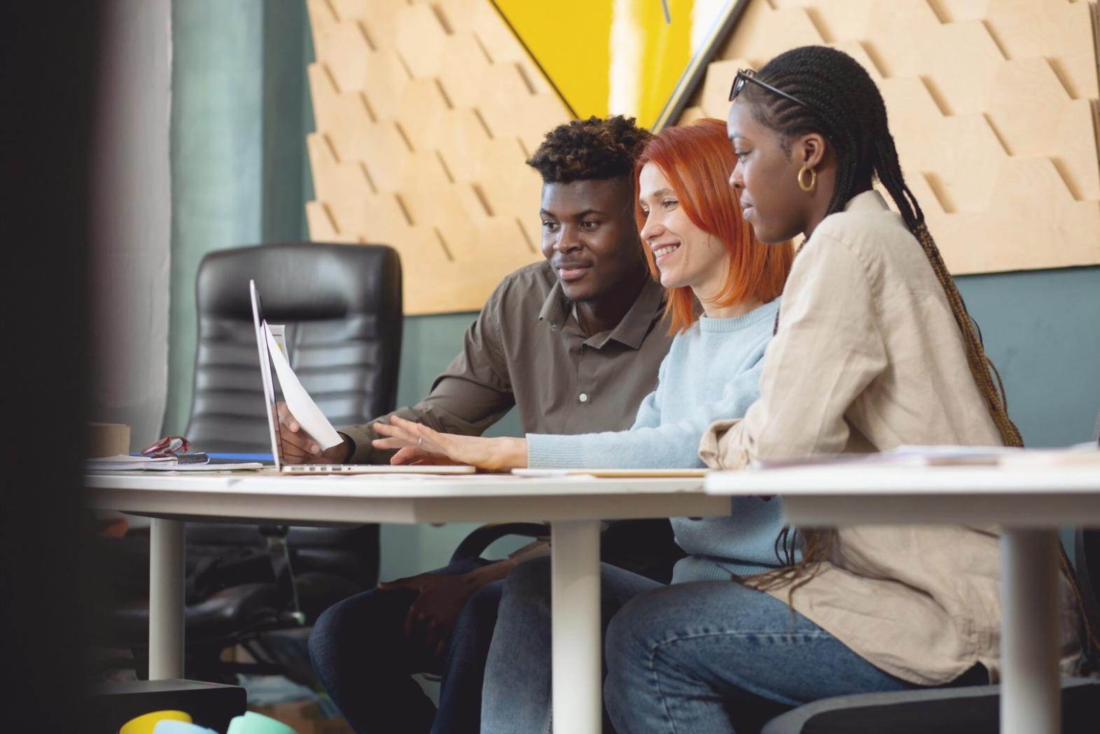 Collaborative learning environment with financial professionals reviewing real-world case studies