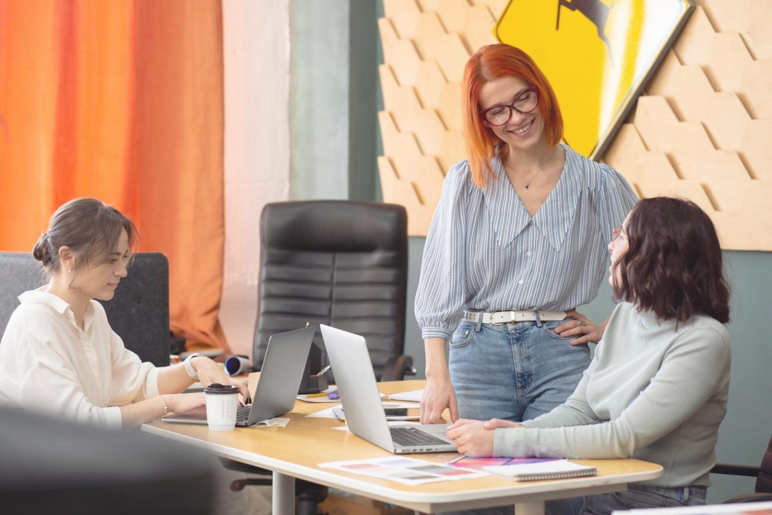 Professional reviewing organized financial documents and data analysis charts